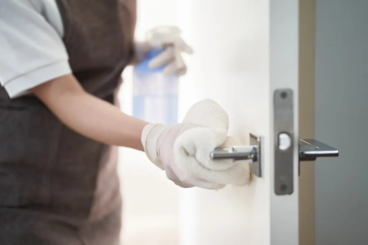 Disinfecting a door handle